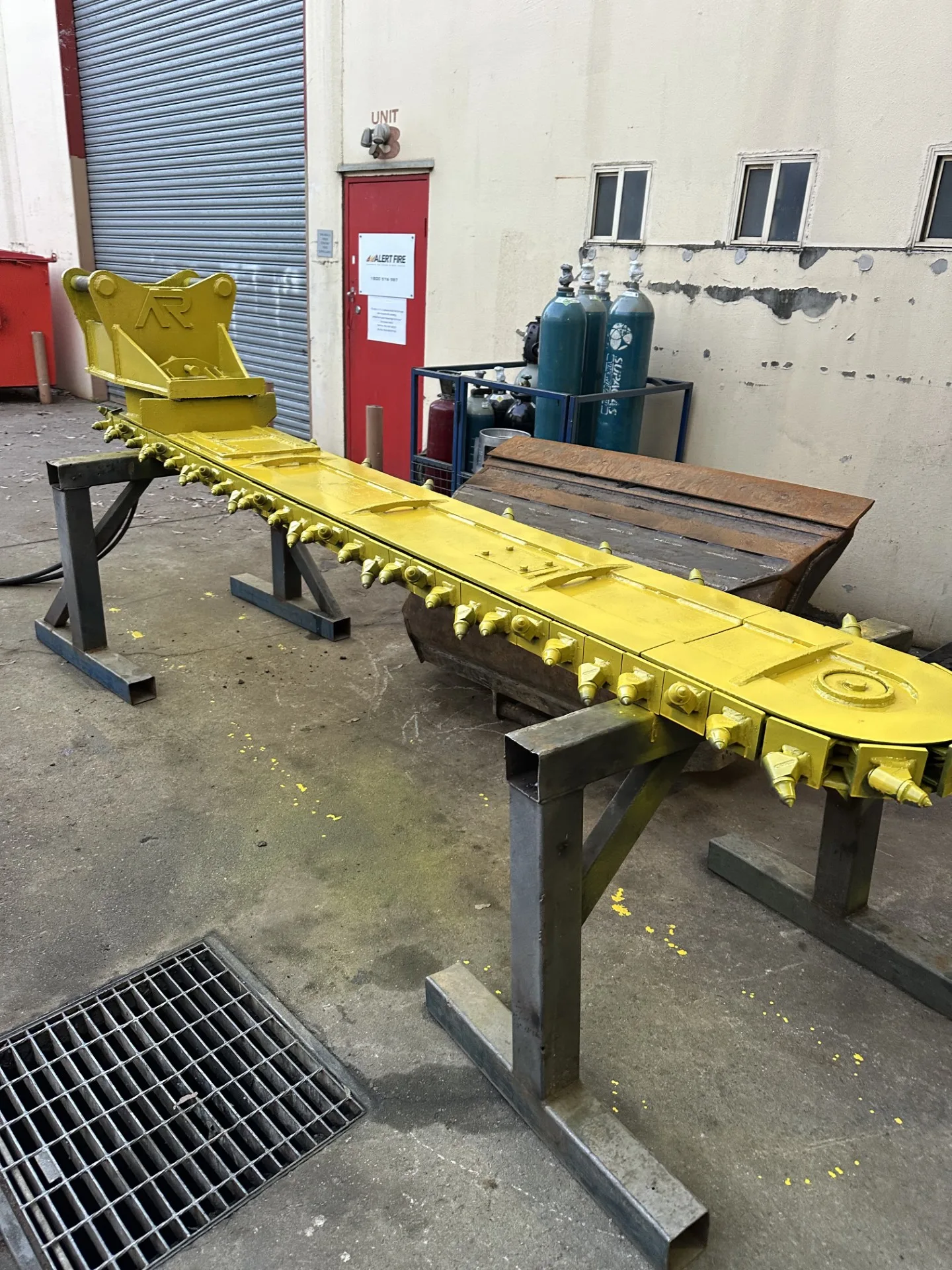 Custom-fabricated rail under-cutter attachment